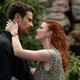 Theo James and Rose Leslie embrace in a scene from HBO series The Time Traveler's Wife.